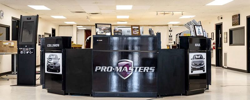 a large room with a pro masters sign on the wall .