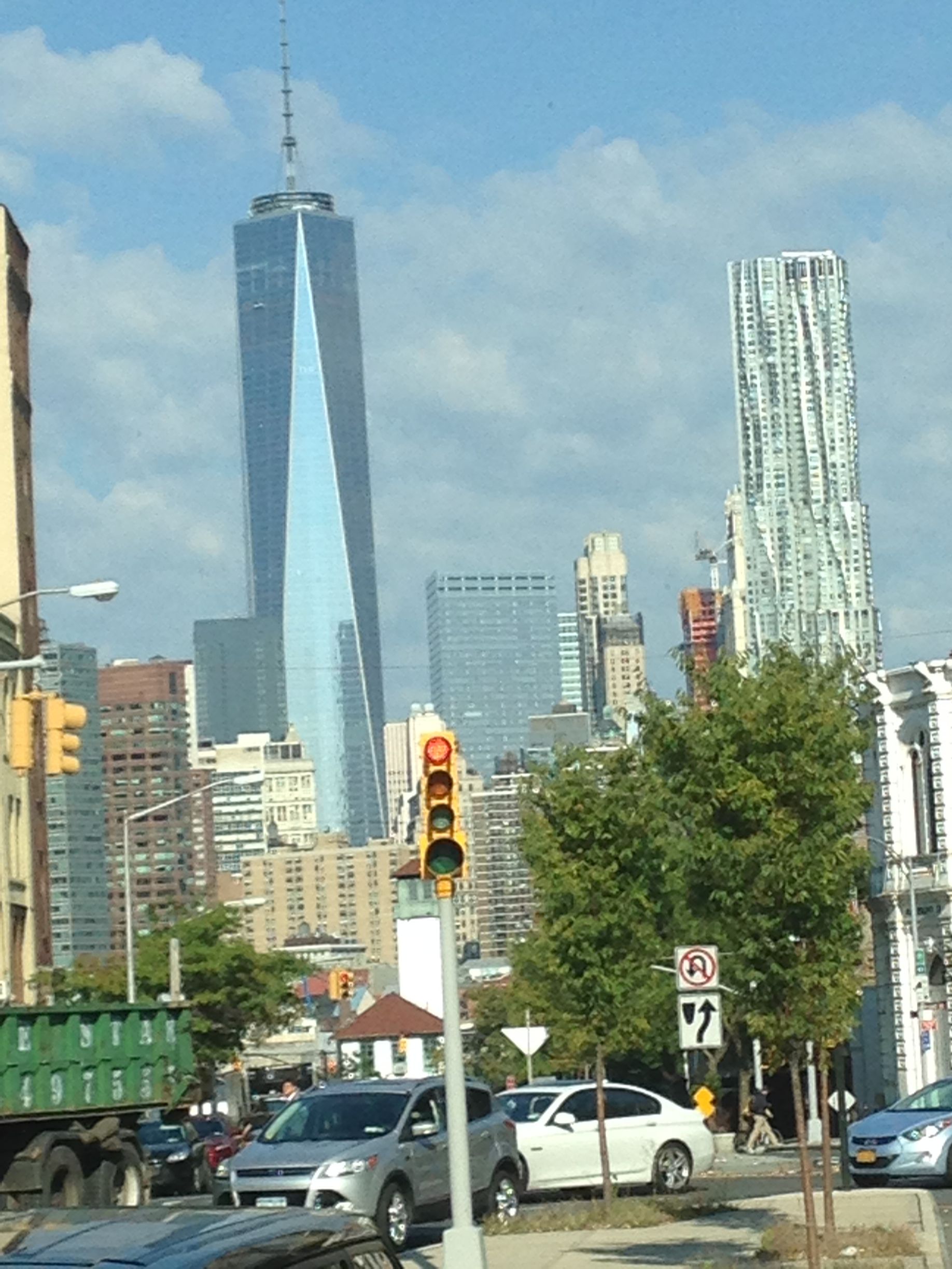 A city street with a sign that says no parking
