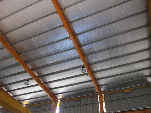 An insulated roof providing energy-efficient protection, featuring layers of high-quality insulation materials to regulate temperature and minimize heat loss or gain.