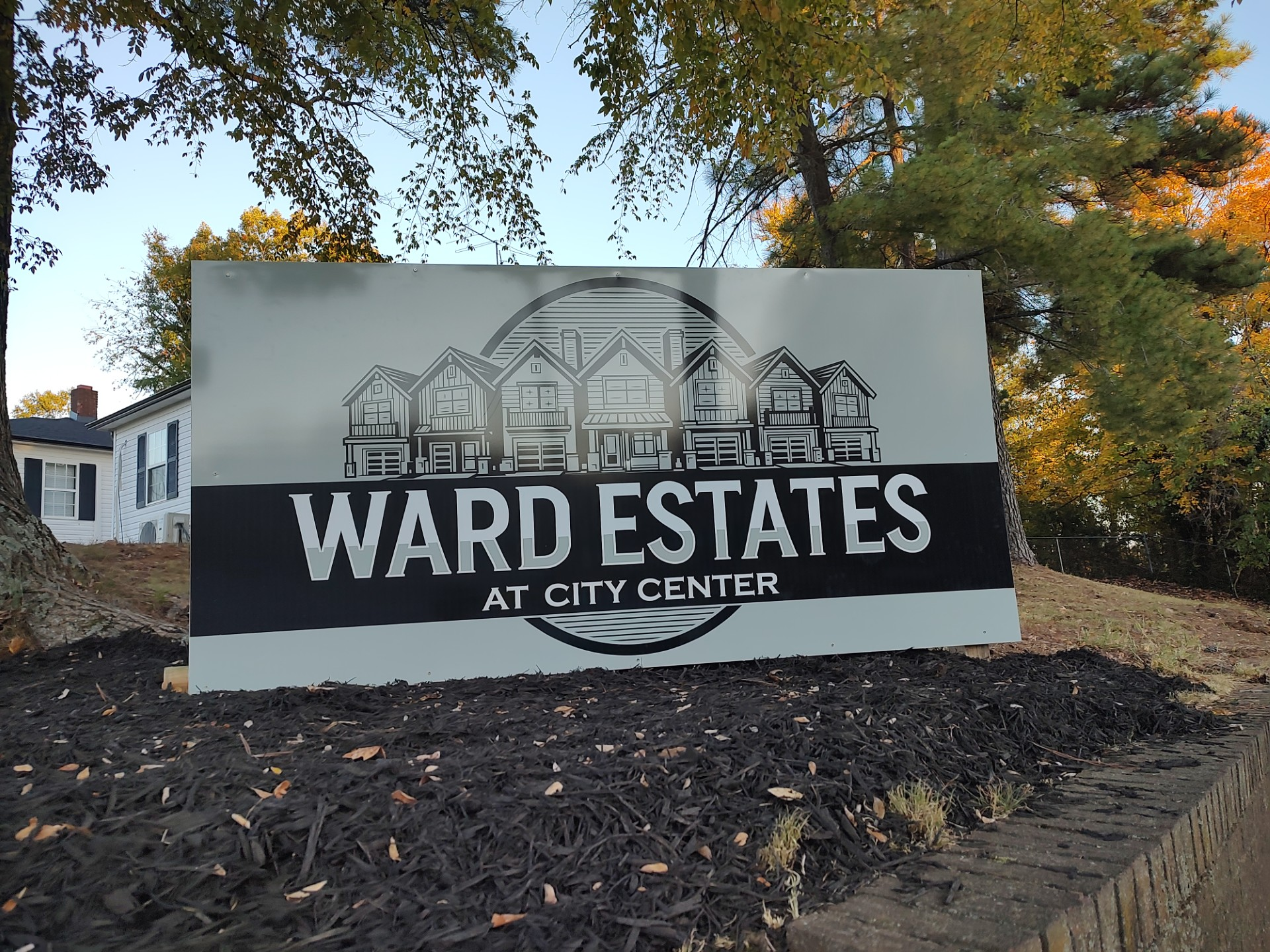 A sign that says ward estates at city center