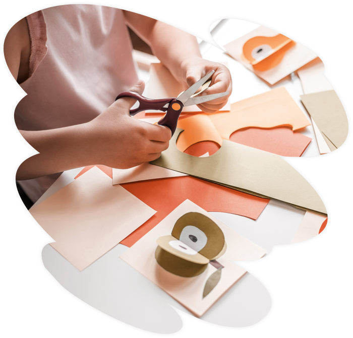 Girl Cutting Papers — Tiverton, RI — Little Willow Girl Cutting Papers — Tiverton, RI — Little Willow