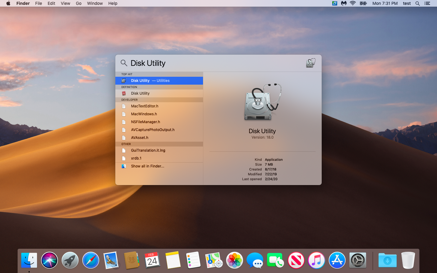 A screenshot of finding Disk Utility with Spotlight