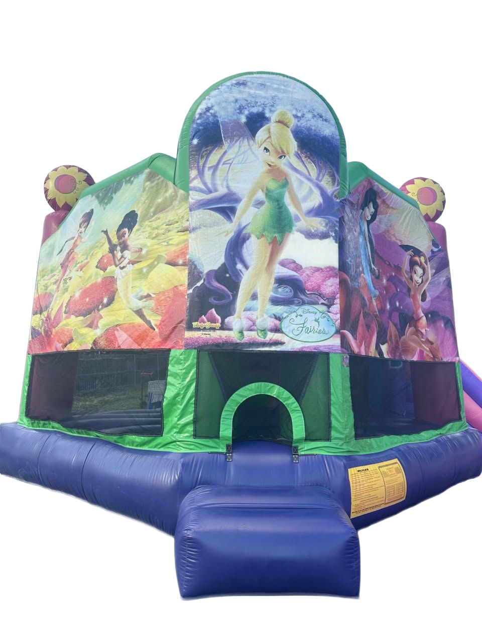 Tinkerbell Bounce House A Tinker Bell-themed inflatable bounce house with green and purple panels, featuring a slide entrance