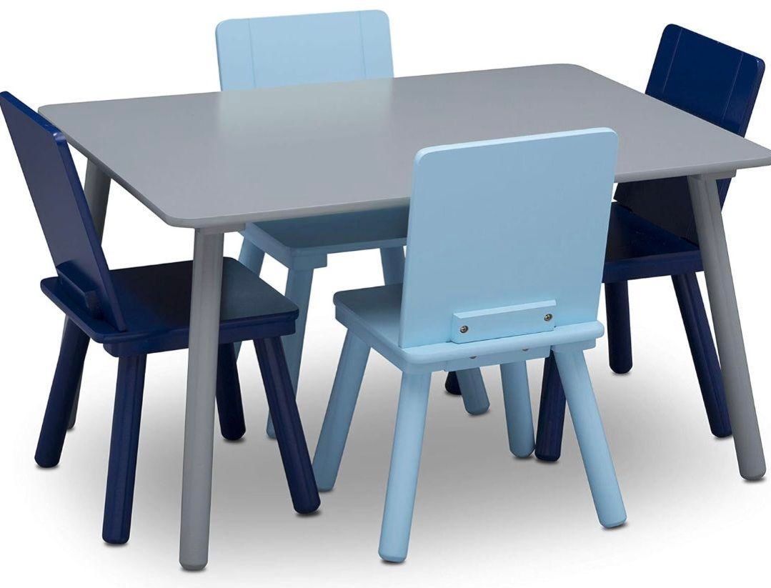 A long table and chairs are set up for a party.