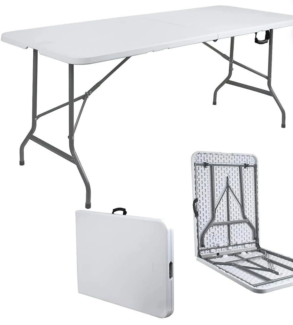 A white folding table with measurements on it