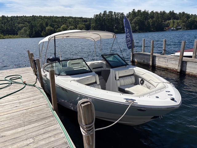Regal LX2 bowrider tied to dock on Lake George