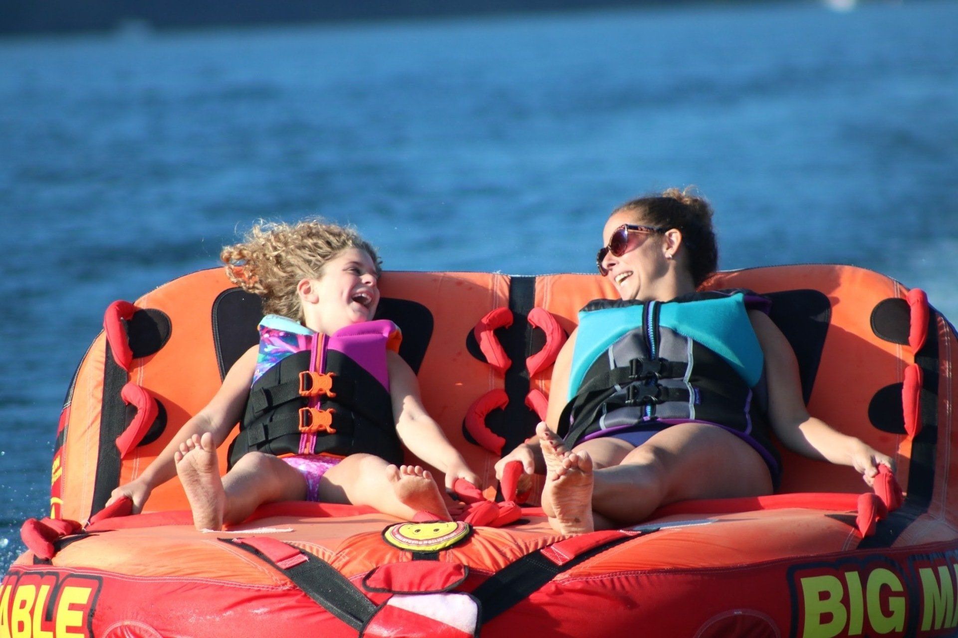 queen-boat-co-family-boating-lake-george-tubing