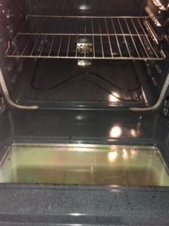 The inside of an oven with the door open