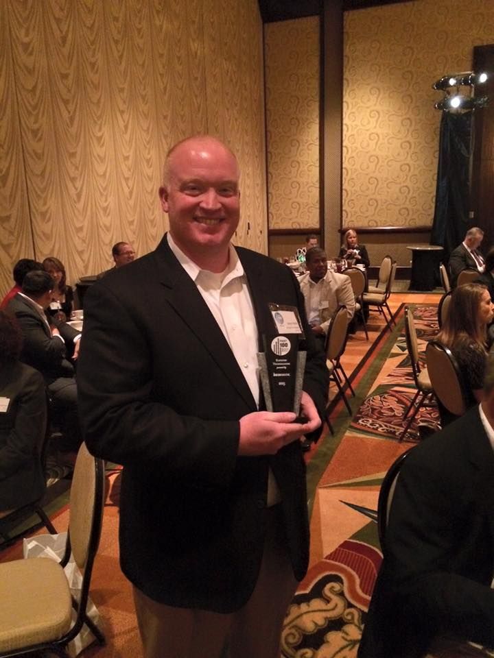 Photo of Jason receiving award