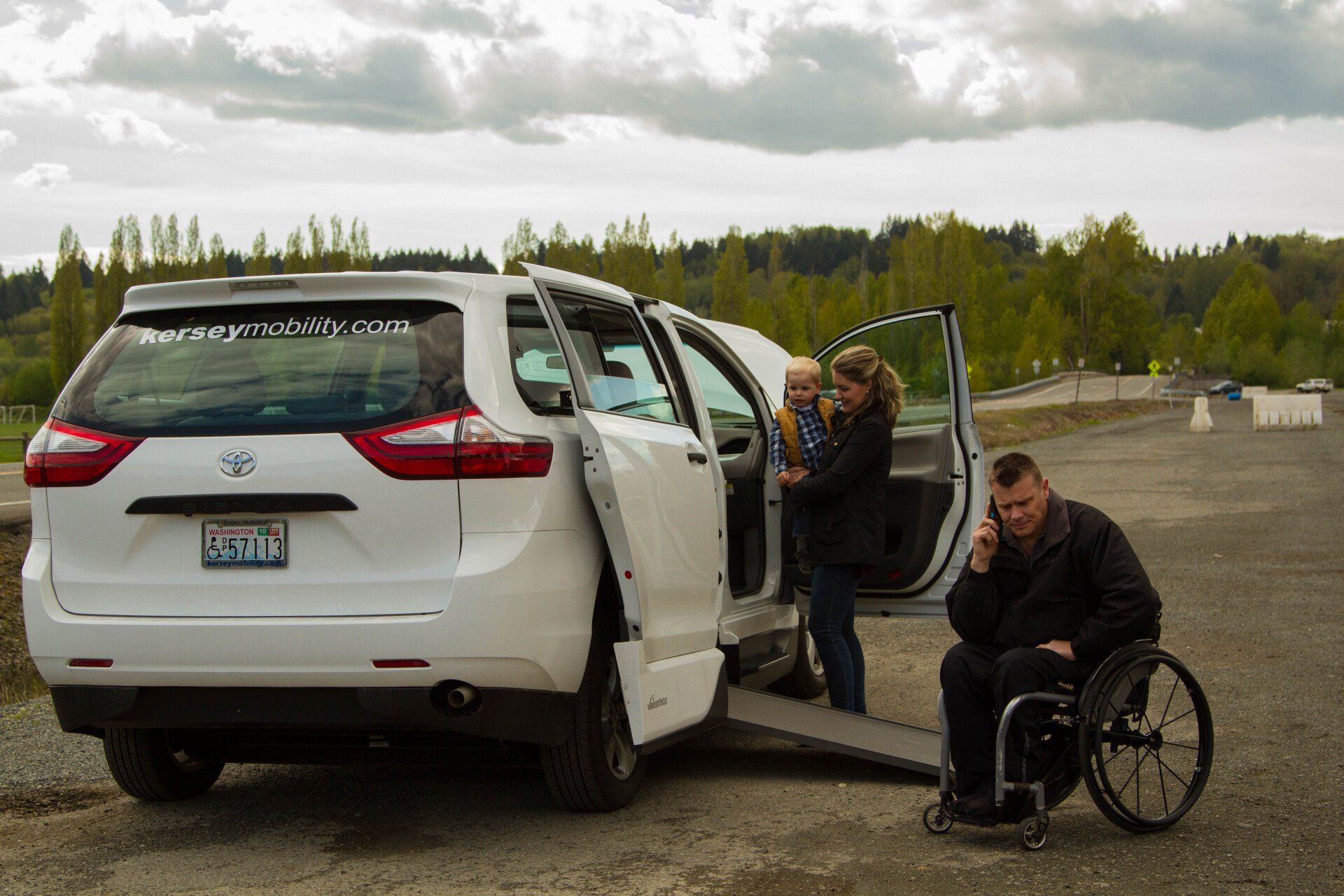 Man in wheelchair calling for Mobility Roadside Assistance