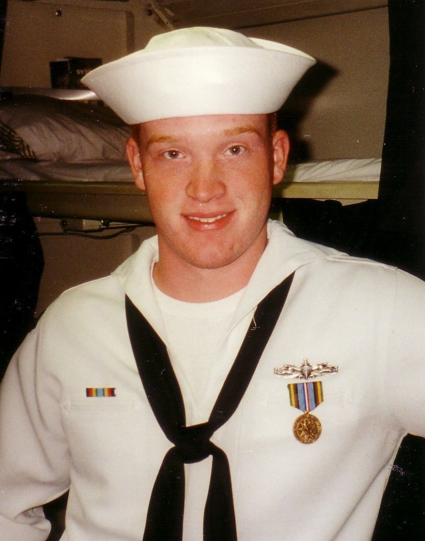Photo of Jason in uniform