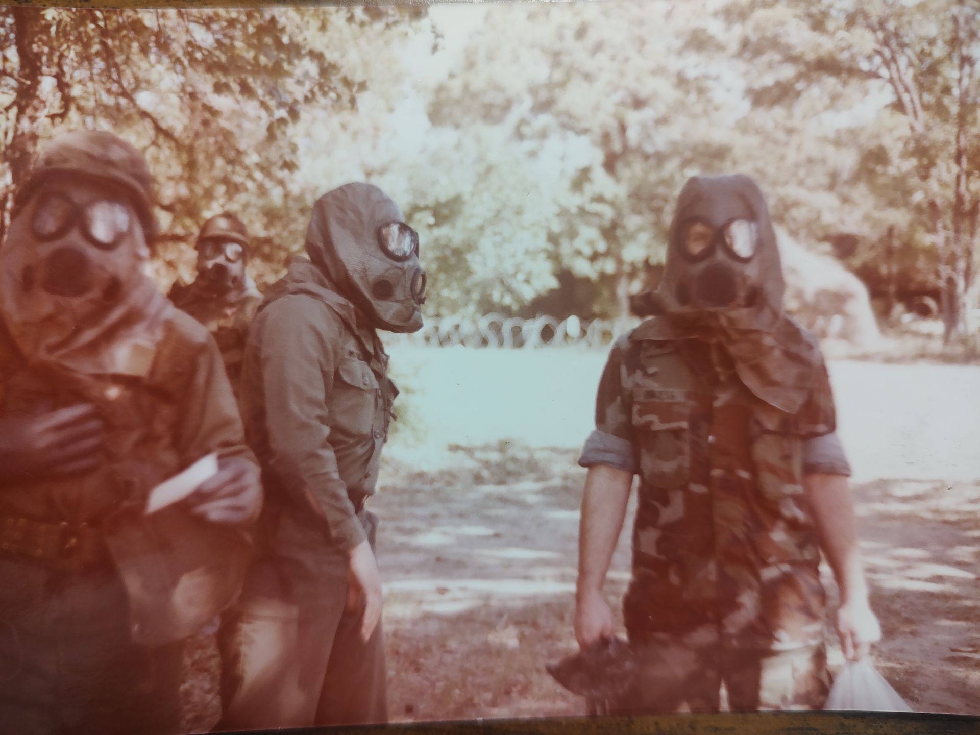 photo of kathleen wearing a gas mask in the Army