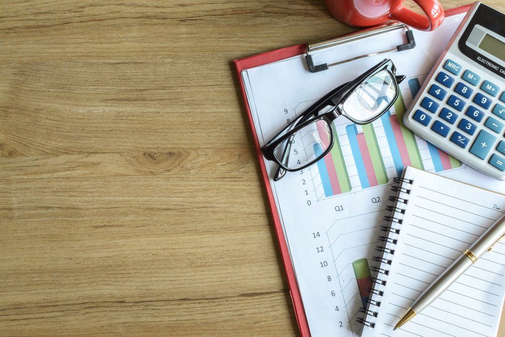 Desk Office Business Financial Accounting — All Finanz and Insurance Solutions PtyLtd in North Mackay, QLD