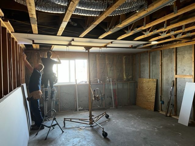team installing drywall