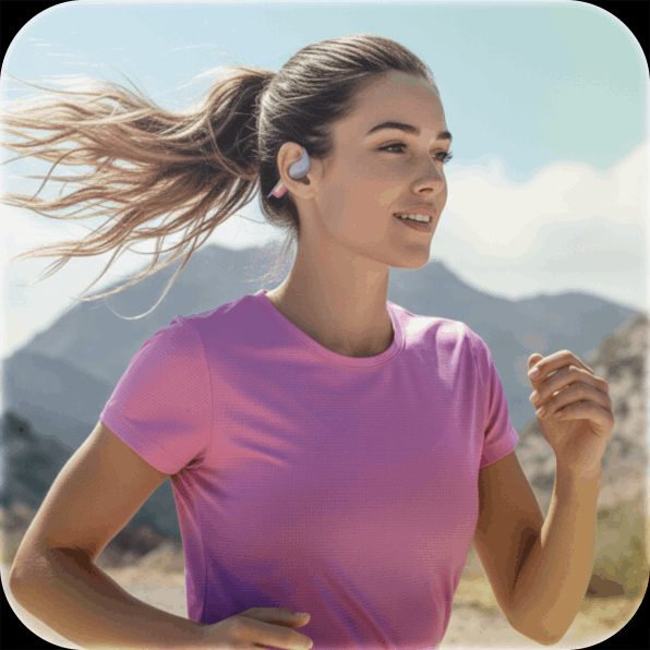 Runner in a pink shirt jogging outdoors with mountains in the background