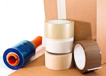 Tape and box, white background — All Removals in Port Macquarie, NSW