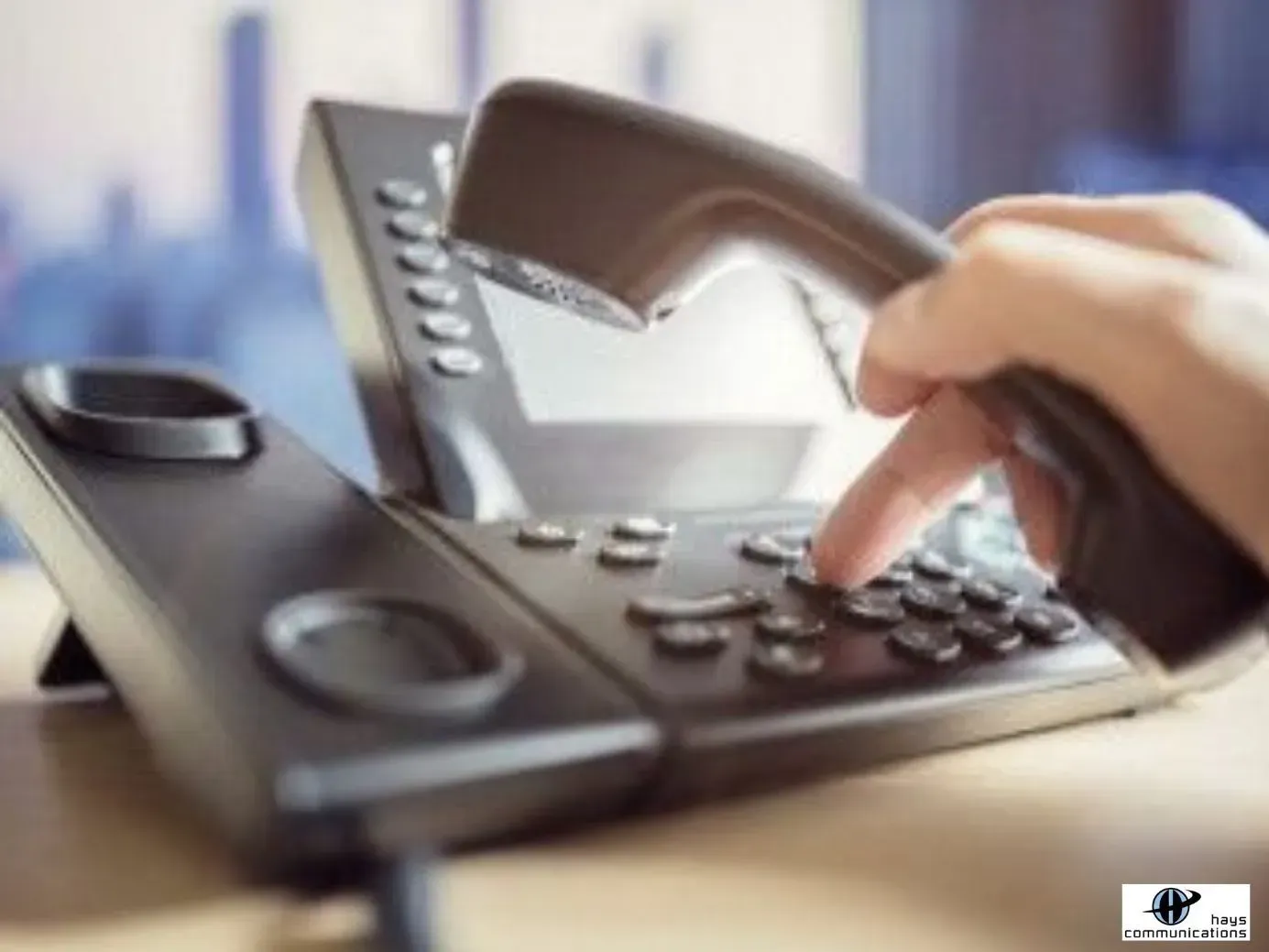 The office worker dials the telephone