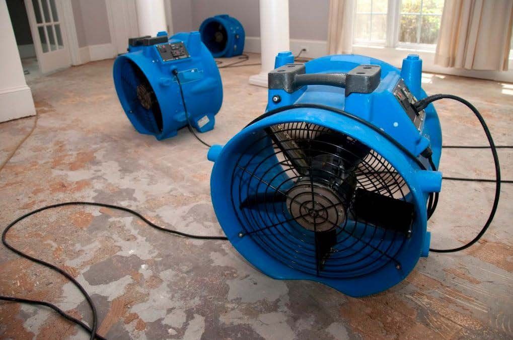 large air mover fans placed in a home