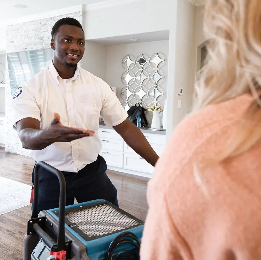 man presenting his hand as a introduction to the business for a customer