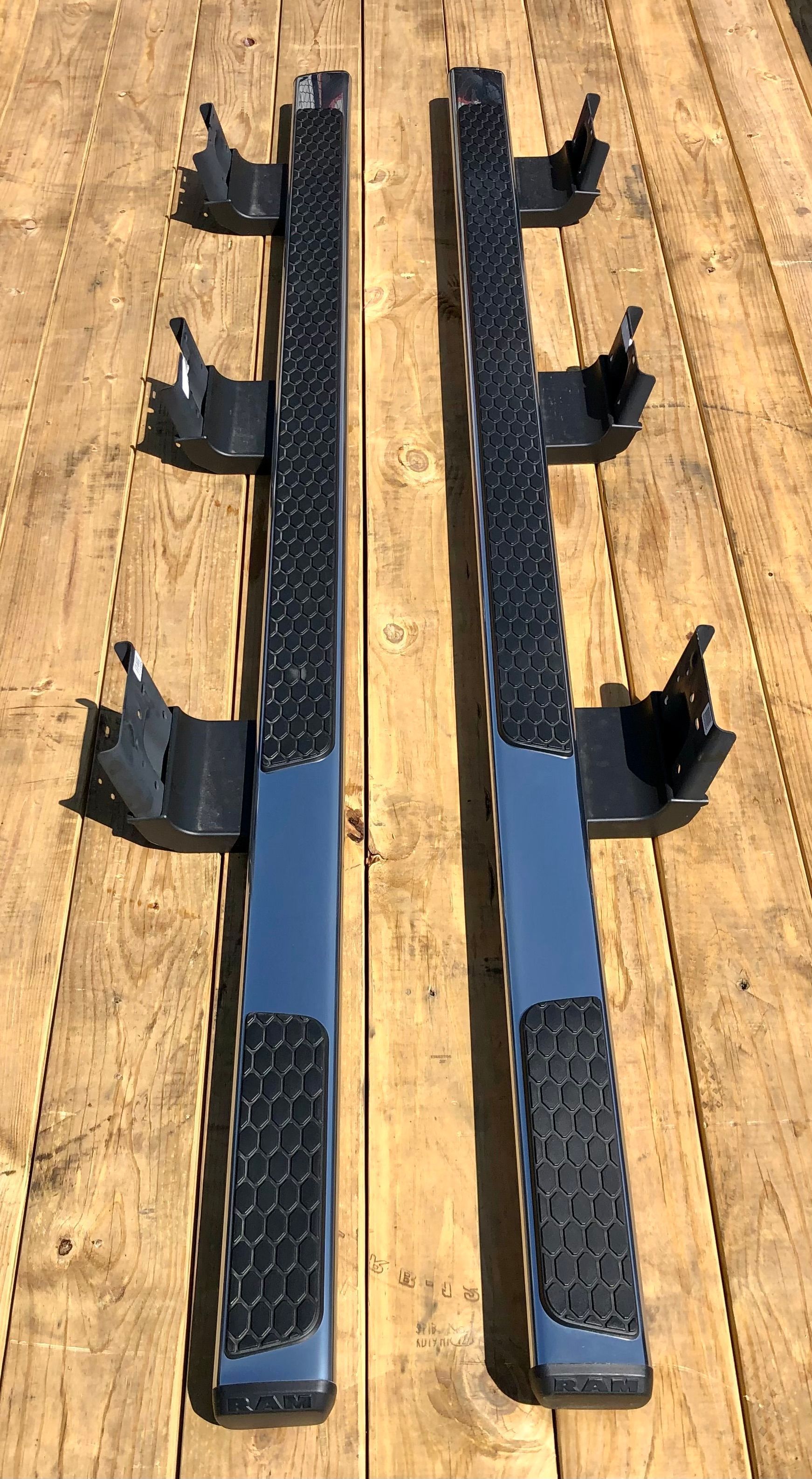 A pair of side steps are sitting on top of a wooden table.