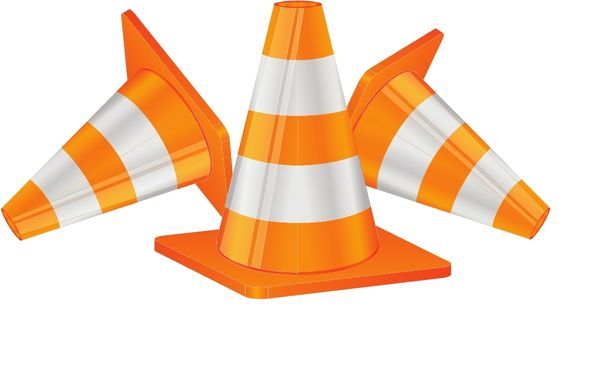 Three orange and white striped traffic cones on a white background