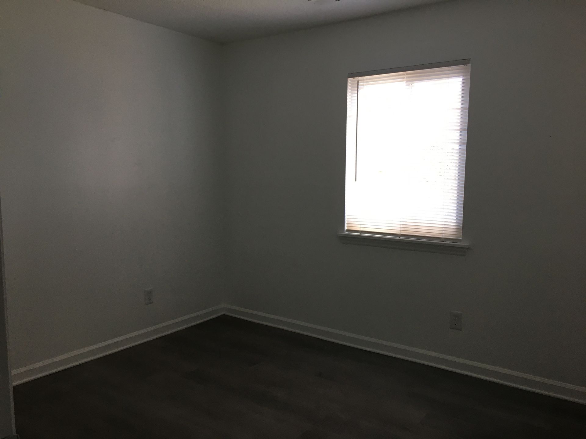 There is a window in the middle of the room.