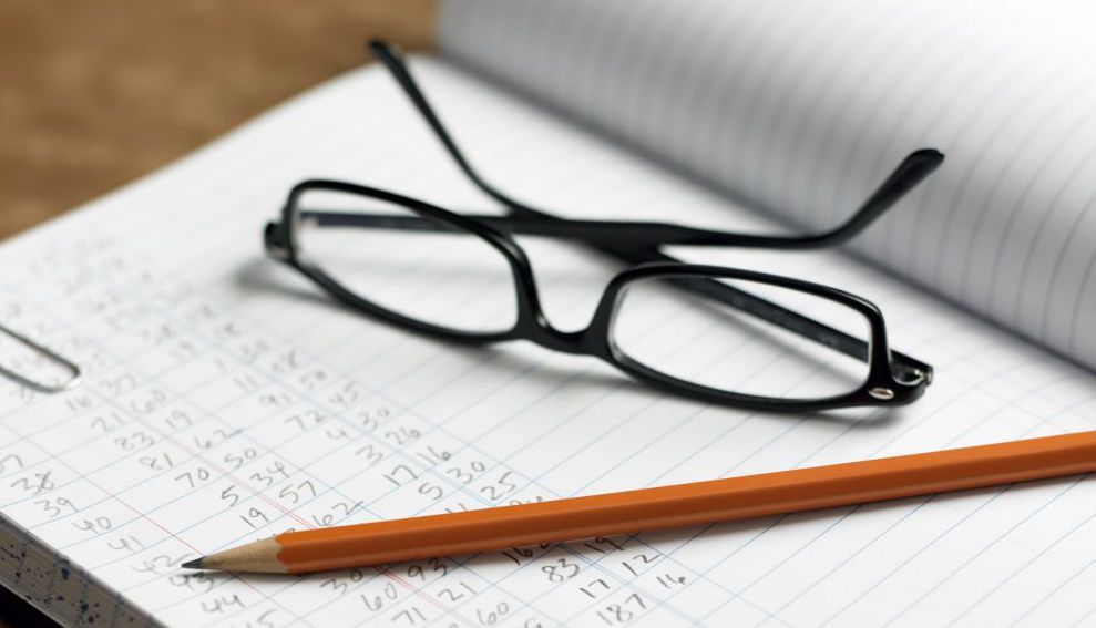 Glasses and Pencil on a Notebook — Russellville, AR — John W. Stottman Jr. CPA, PA.