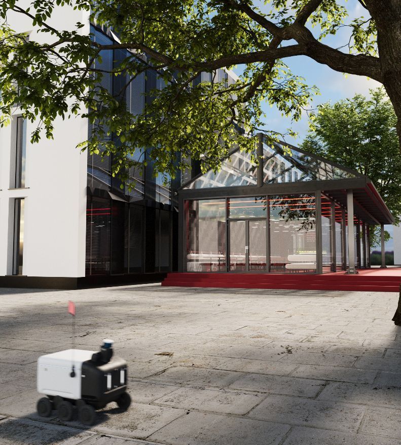 Ein kleiner Roboter steht vor einem Gebäude