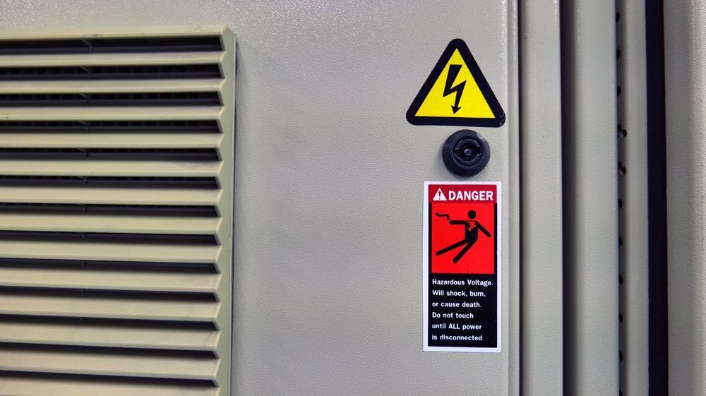 Electrical Panel With a Lightning Bolt Hazard Warning — Brian Williams Electrical Air Solar in Maroochydore, QLD