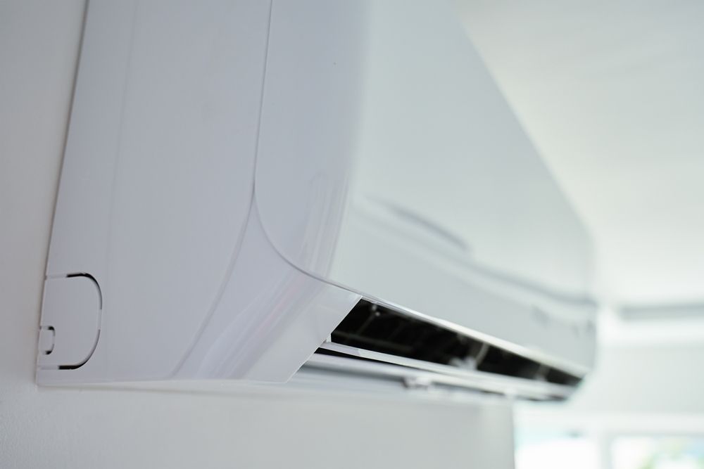 A White, Wall-mounted Air Conditioning Unit Indoor — Brian Williams Electrical Air Solar in Cooroibah, QLD