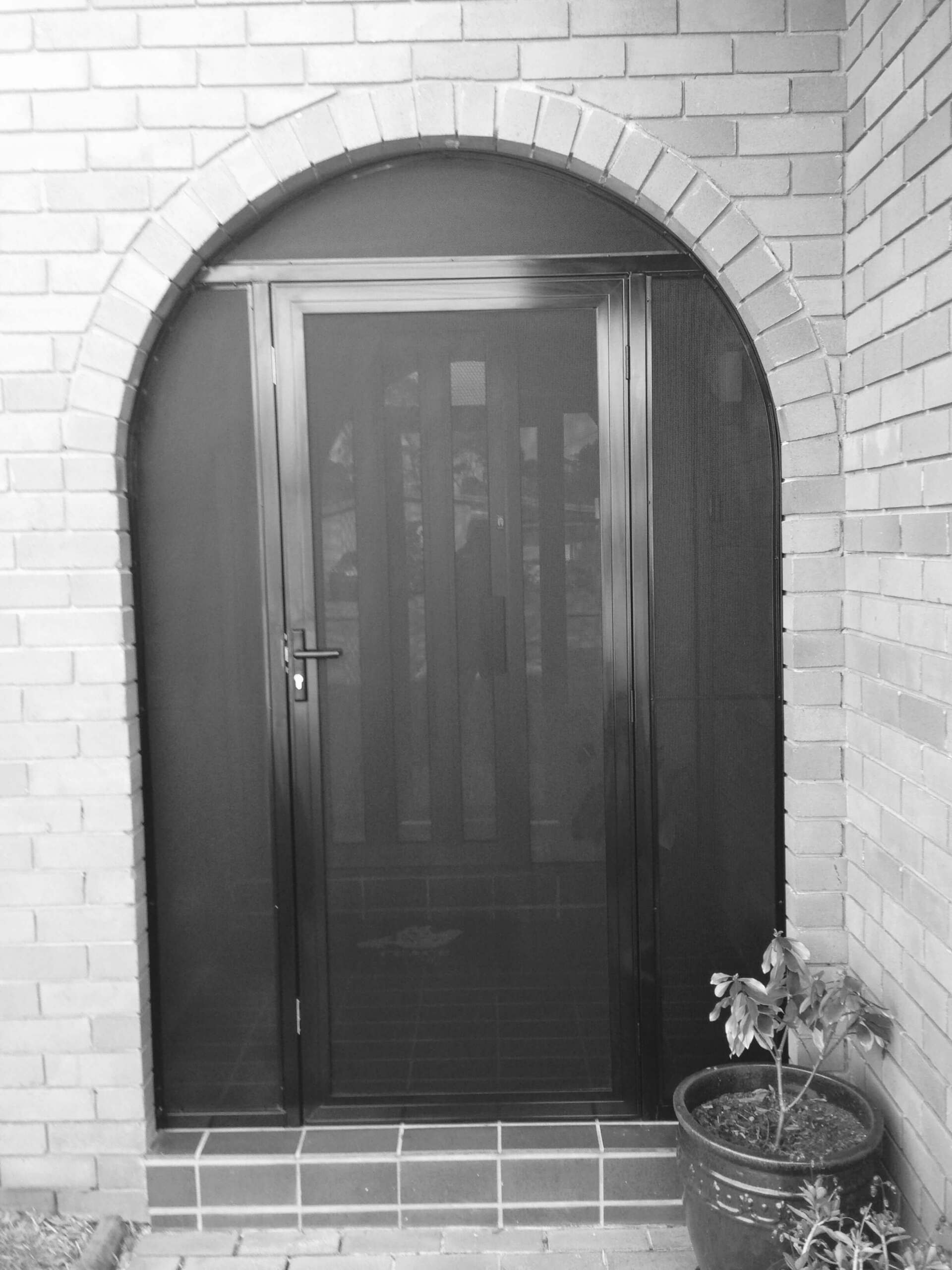 A Door With Security Hinges & Screen — Clearshield Security Screens in Bomaderry, NSW