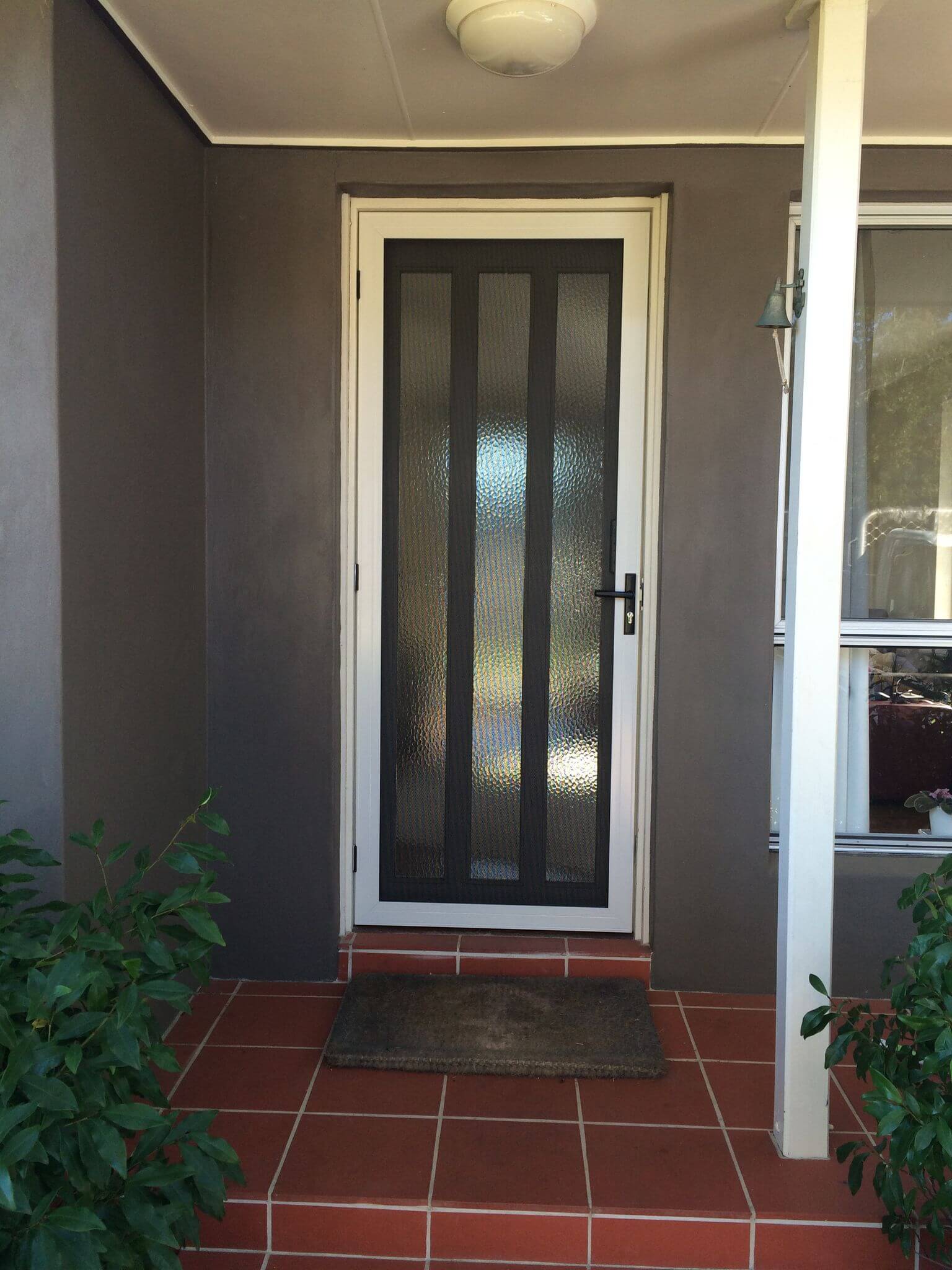 A Door With Security Hinges — Clearshield Security Screens in Bomaderry, NSW