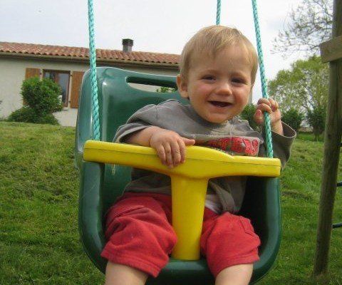 toddler on swing