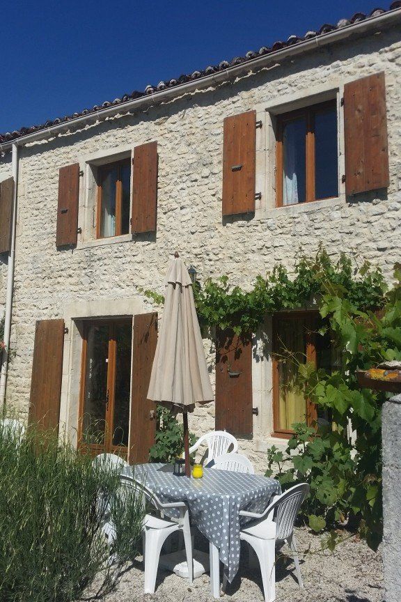 stone gite with wooden shutters