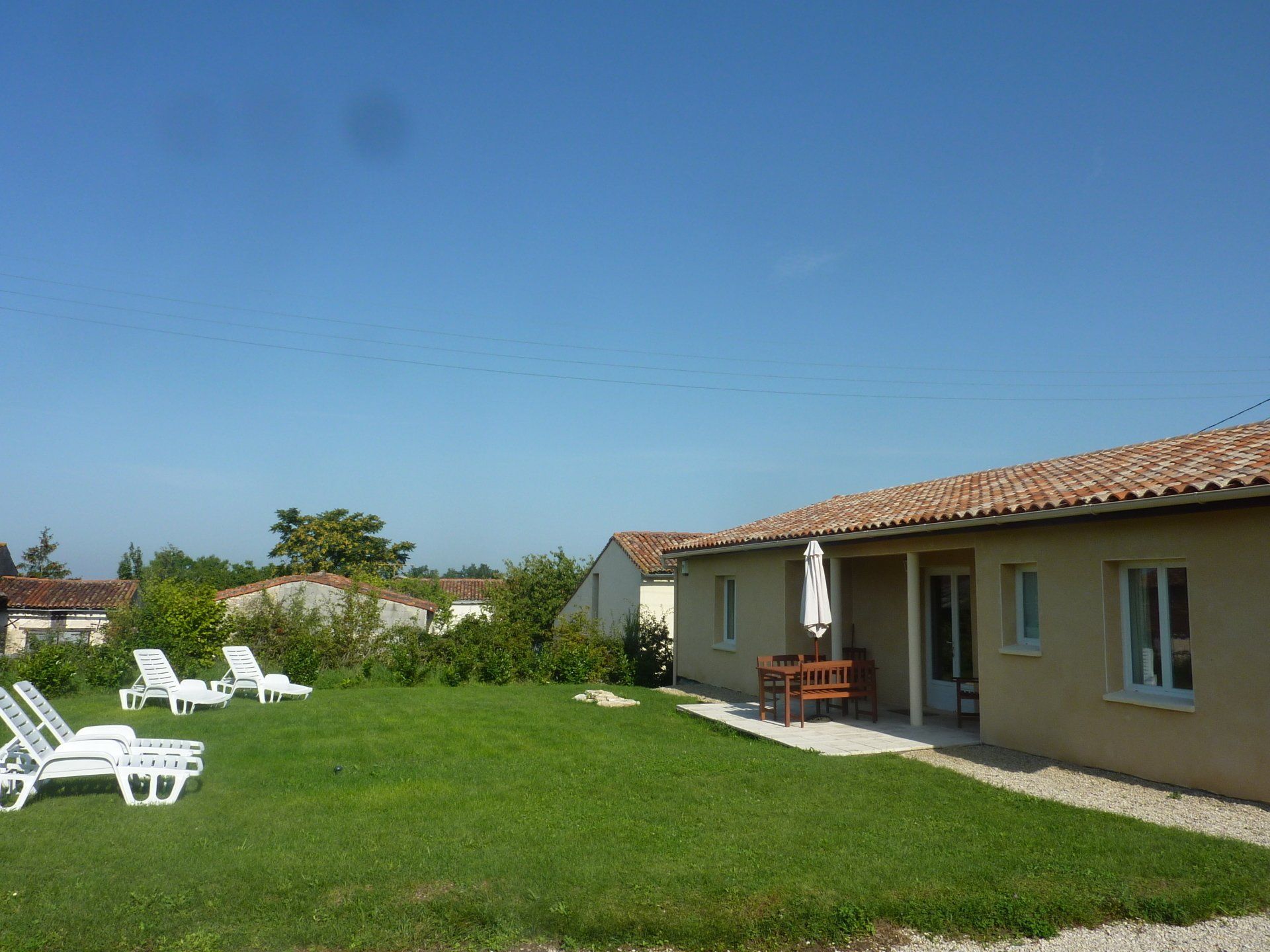one storey house with a grassed garden