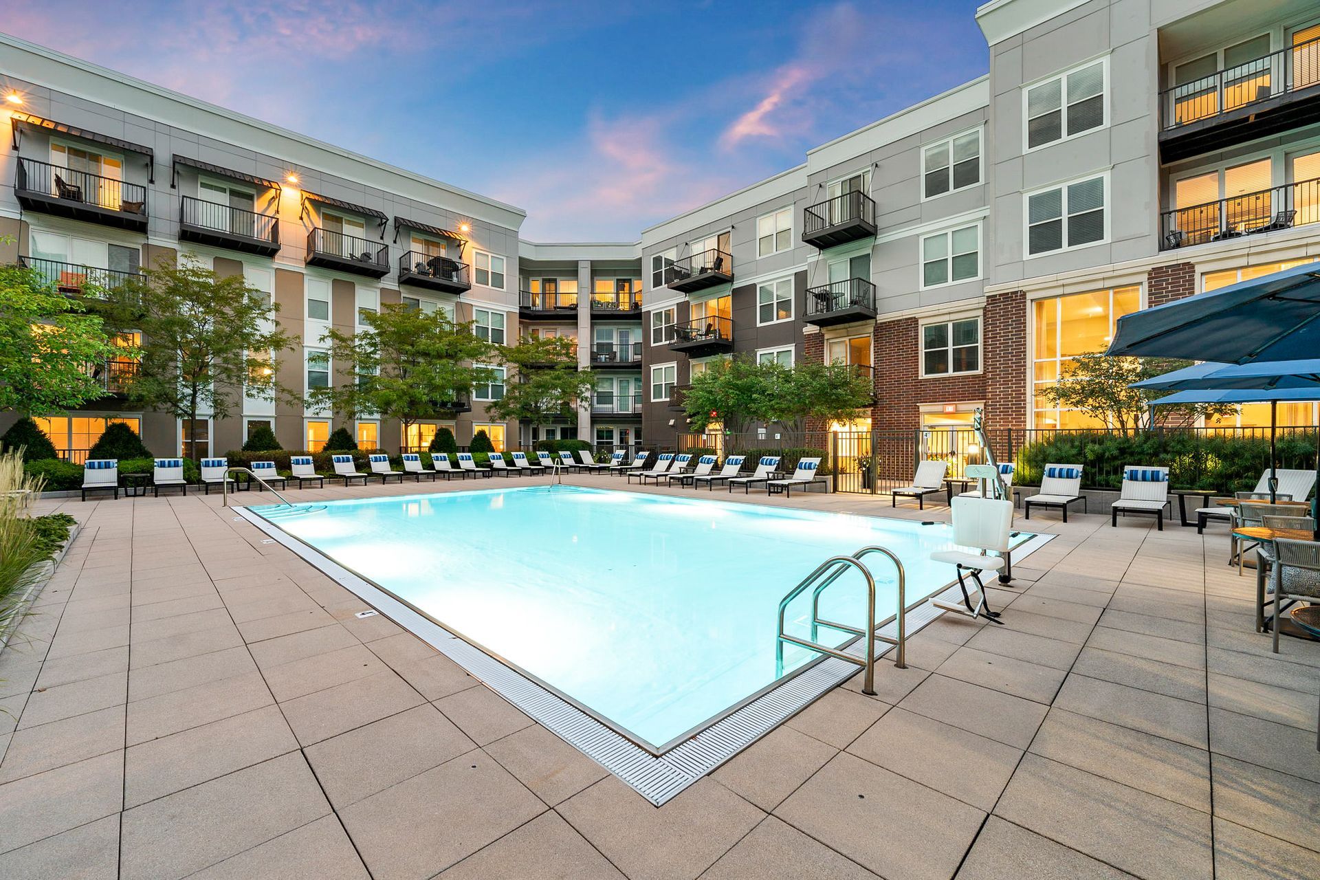 swimming pool outside the Marq on Main apartment building in Lisle, IL