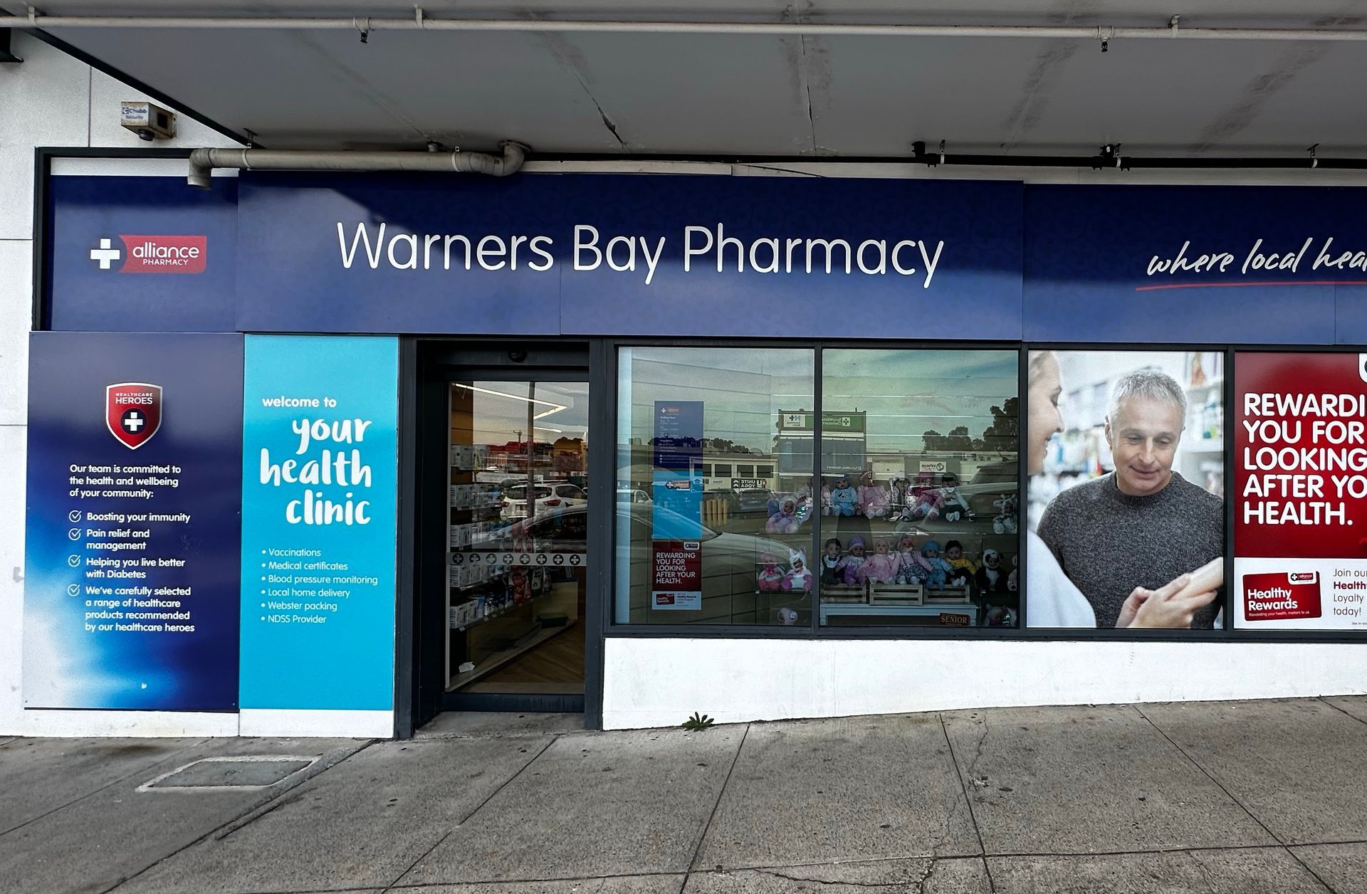 a Doctor is Examining a Patient's Wrist in a Hospital — Warners Bay Pharmacy In Warners Bay, NSW