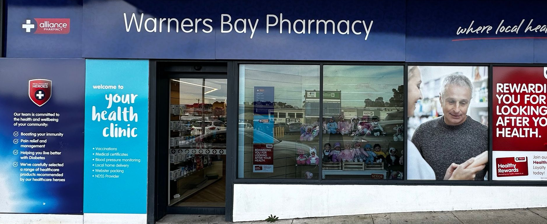 a Nurse is Writing on a Patient's Foot With a Marker — Warners Bay Pharmacy In Warners Bay, NSW