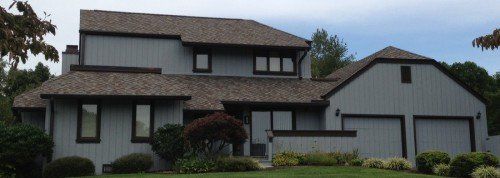 House with brown roofing - roofing in Bristol, TN