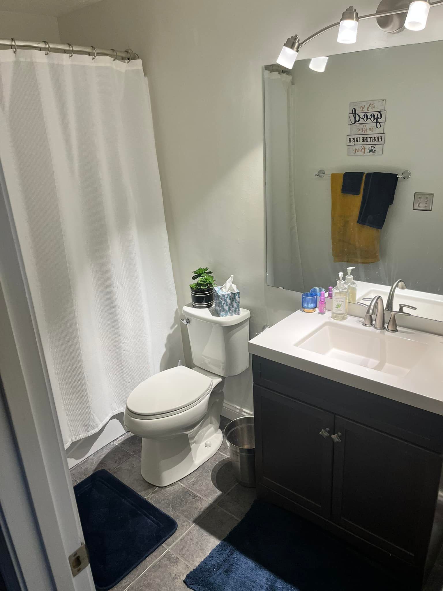 Bathroom fixture installation with sink and toilet