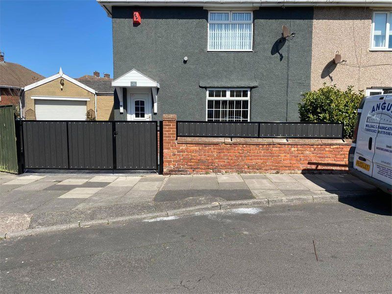 Charcoal black composite gates and railings fitted