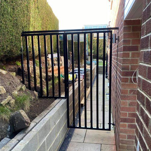 Black outdoor outlet gate