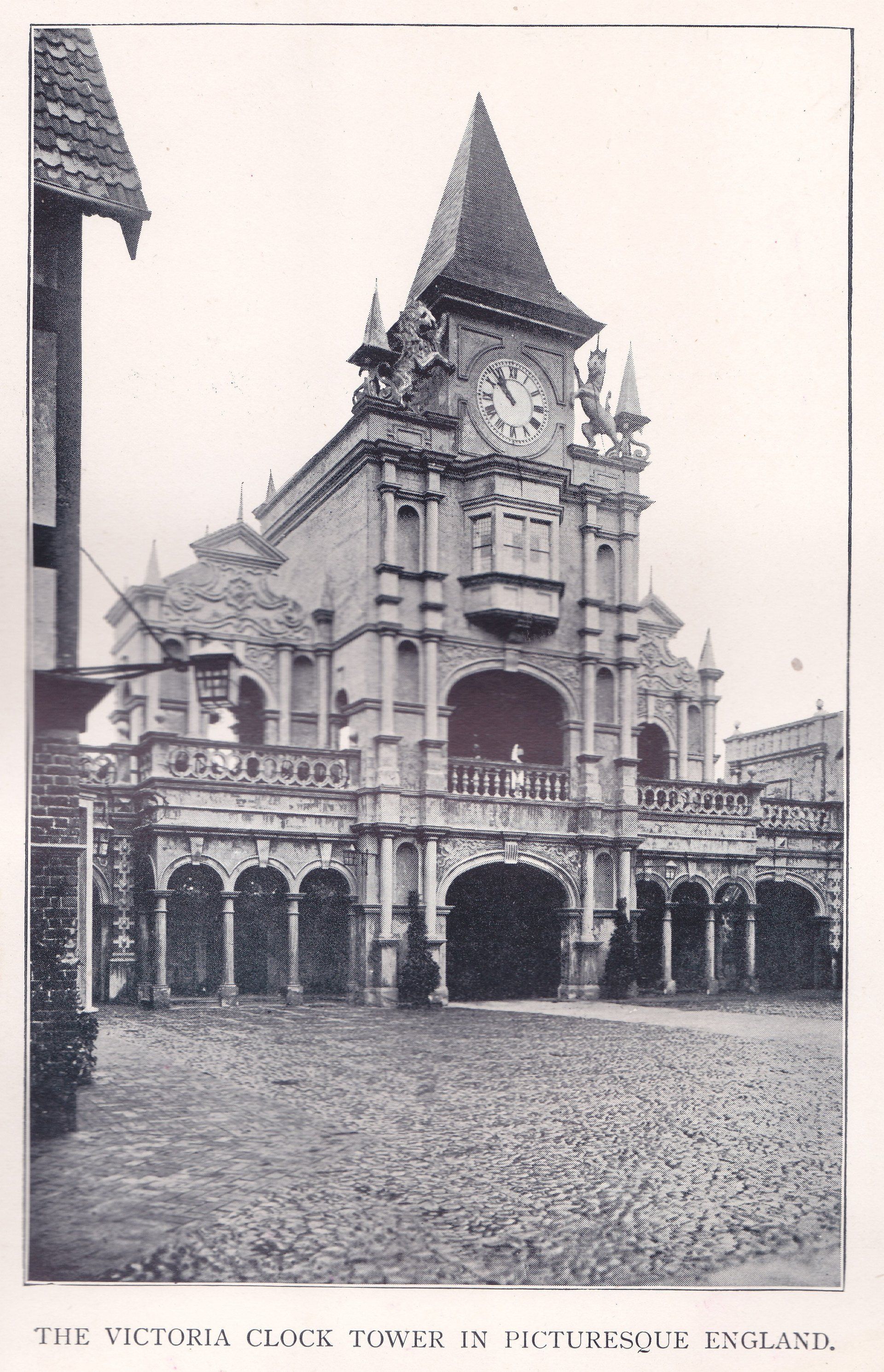 THE VICTORIA CLOCK TOWER IN PICTURESQUE ENGLAND.
