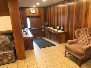 There is a chair in the middle of the room.