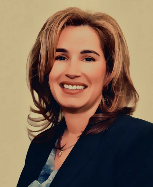 A woman is smiling and wearing a black jacket
