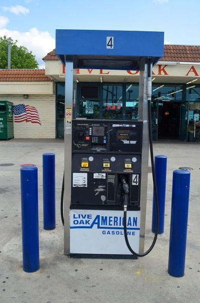 A gas pump that says Live Oak on it