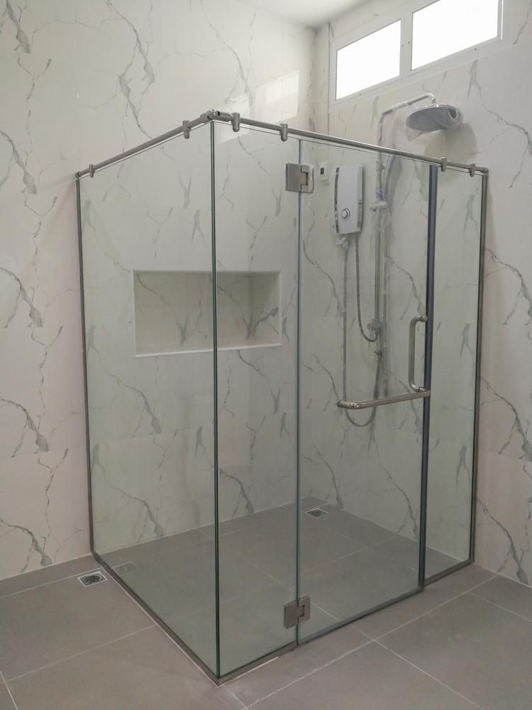 A Bathroom with A Shower Stall and A Shower Head — Distinctive Glass In Forster, NSW