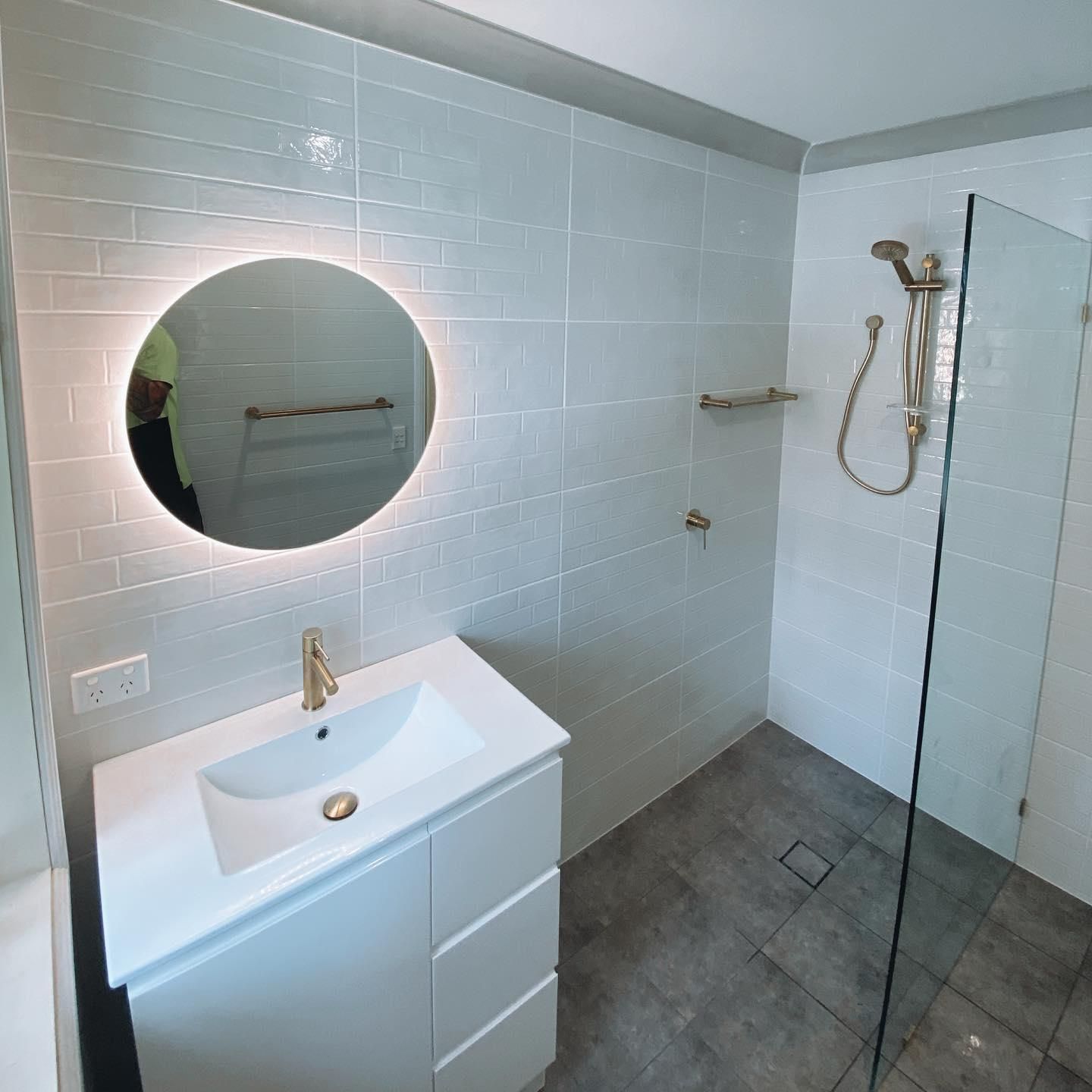 A Bathroom with A Sink, Mirror and Shower — Distinctive Glass In Toormina, NSW