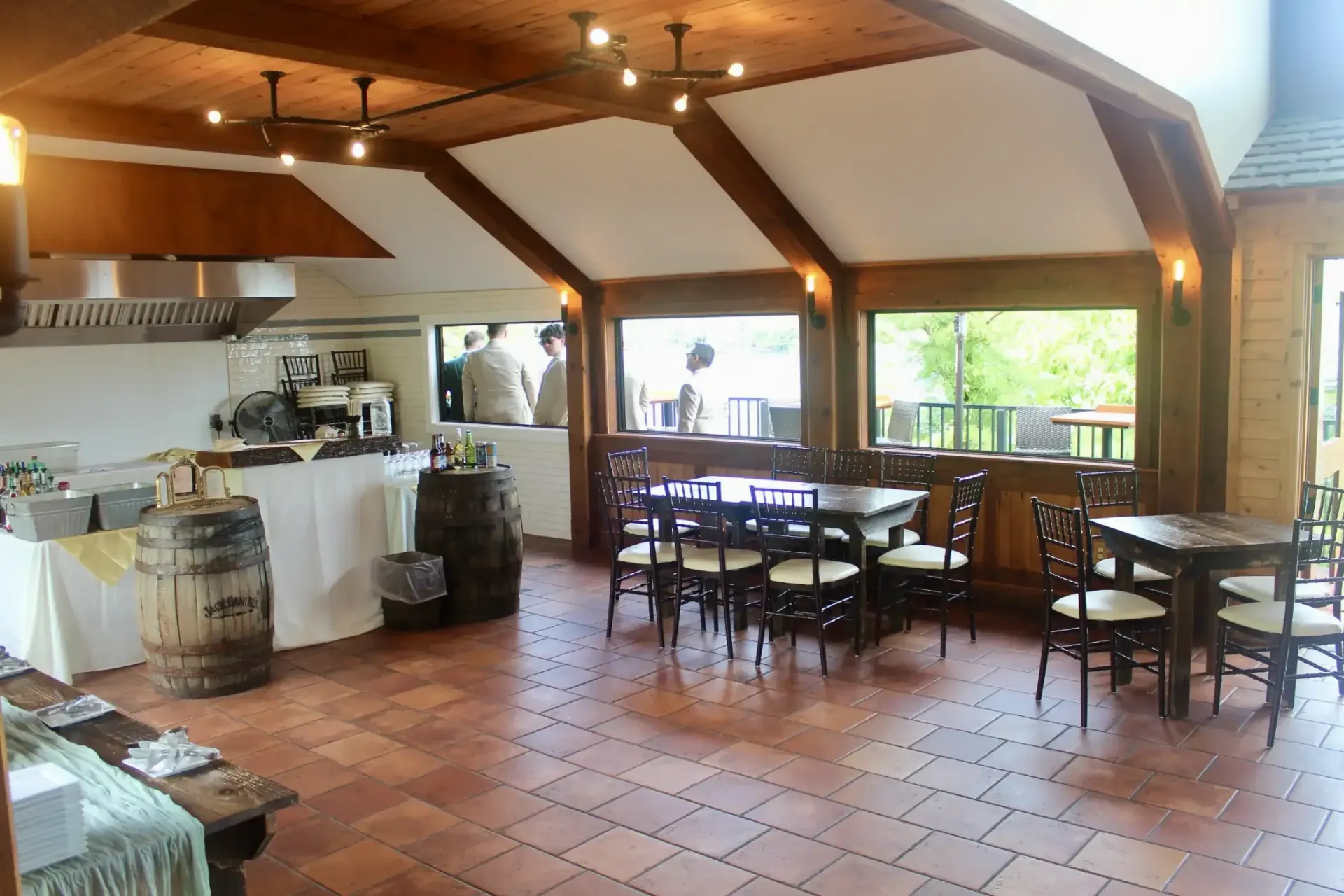 A large room with tables and chairs in it