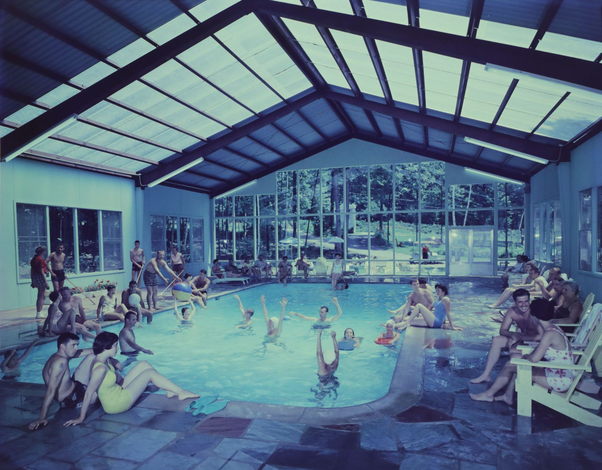 A group of people are swimming in the old Blue 